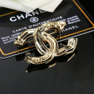 CHANEL Golden Orbit CC Sculptural Brooch