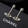 CHANEL Elvina Crystal Chain Cross Earrings