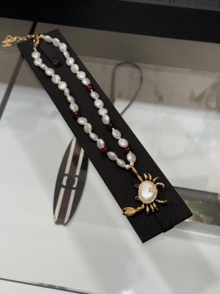 CHANEL Soleil Pearl Charm Necklace
