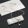 CHANEL Pearl Frame Emblem Pendant Necklace