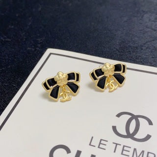 Chanel Camellia black bow stud earrings