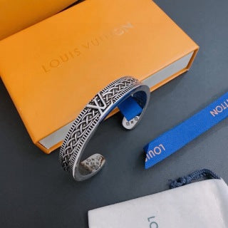 Louis Vuitton Heritage Woven Cuff Bracelet