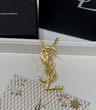 YSL Cassandre Signature Gold Brooch