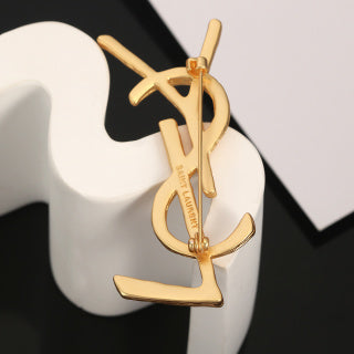 YSL Sculpted Gold Monogram Brooch
